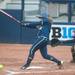 Michigan senior Ashley Lane hits the ball during the first inning for their game against Iowa at Alumni field Saturday, April 20.
Courtney Sacco I AnnArbor.com